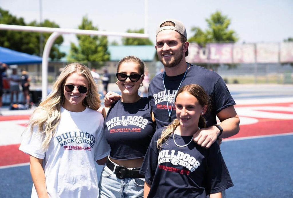 Jake with his family outside