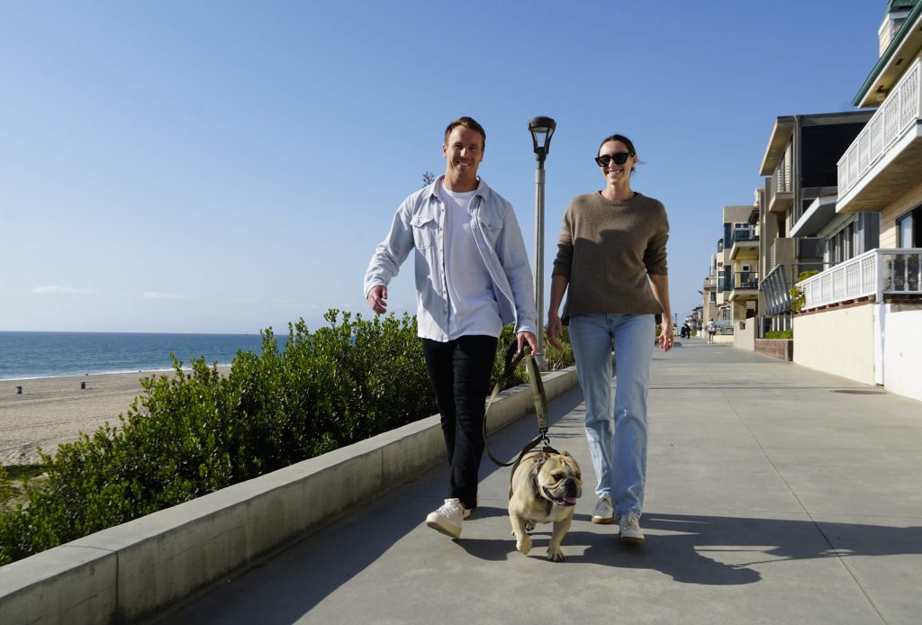 Patrick and Bryce walking their dog, Teddy