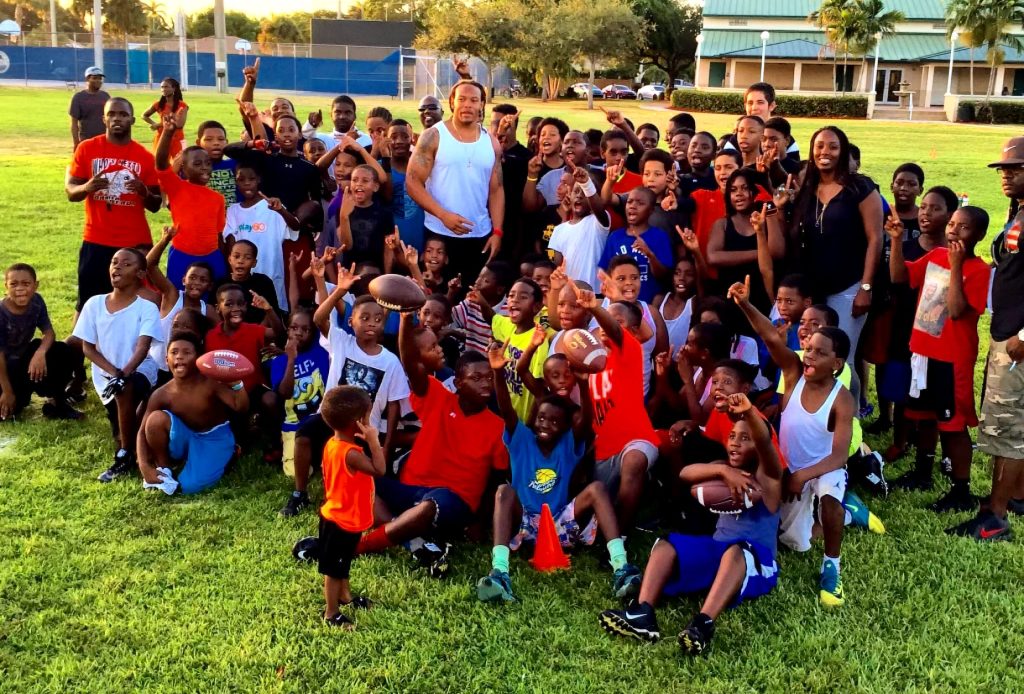 Jabaal in a crowd of attendees of a youth camp