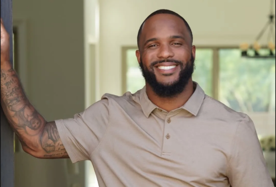 Jamar Taylor in doorway of one of his real estate properties